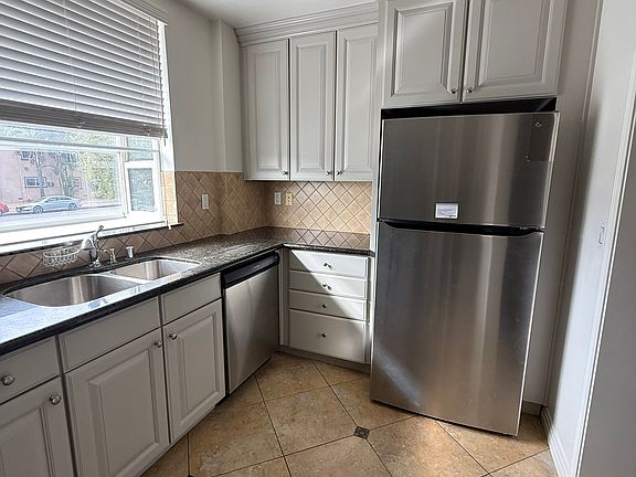 Kitchen with New Refrigerator with Bay Window Sink facing Laurel Canyon Blvd