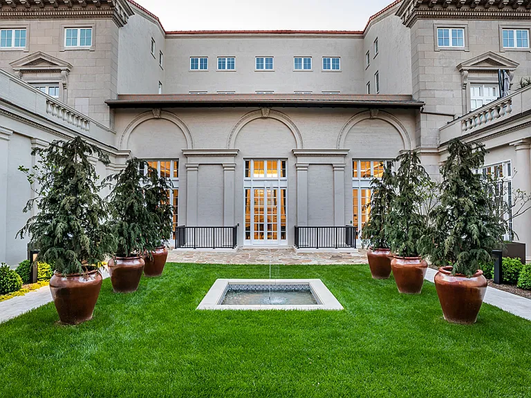Renovated historic courtyard with public and private seating areas