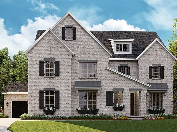 Tiburon B - English Cottage 3-Car Side Load Garage Note Renderings may show optional features