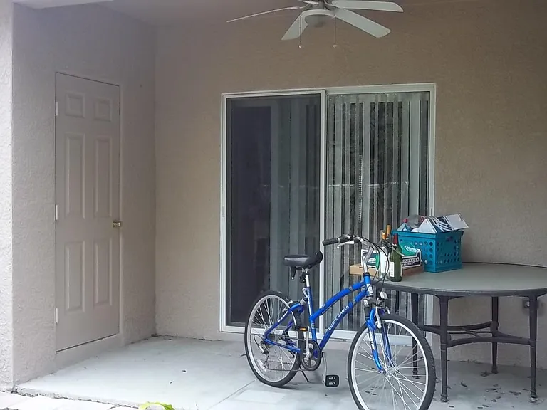 Lanai with small storage room