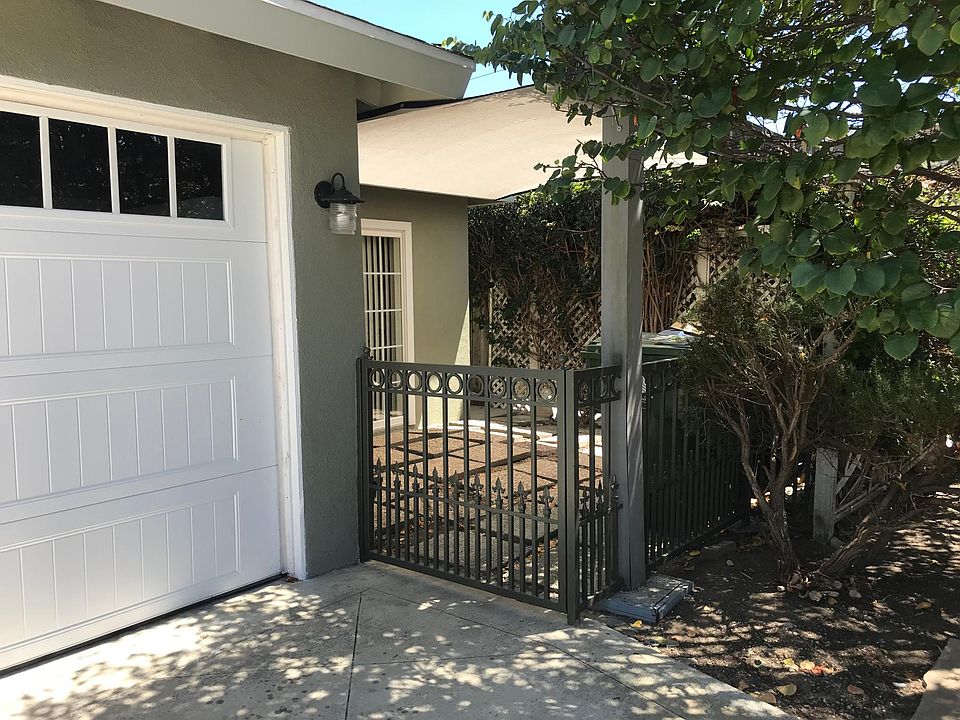 Front of house with cute private patio