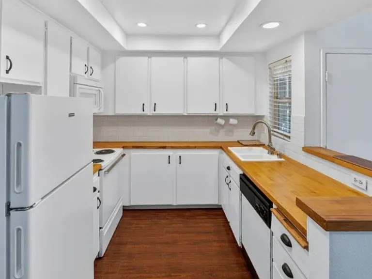 Kitchen and front door as seen from dining room