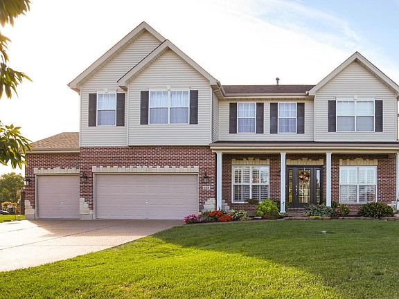 Gorgeous 4 bedroom, 3.5 bath 2 story home with nearly 4000 sq. feet of living space. Situated on a cul de sac on .33 acre & located in desirable Manors At Meadowbrook subdivision in Lake Saint Louis.