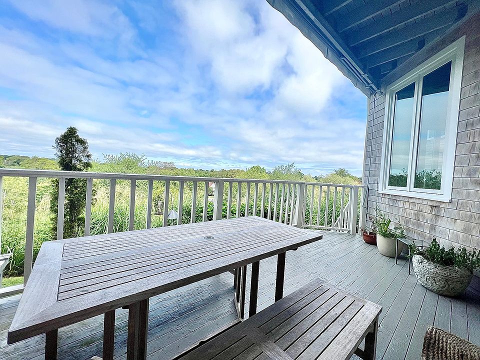 Peaceful & private - outdoor deck, newly refinished with teak table and benches. The views are so serene!