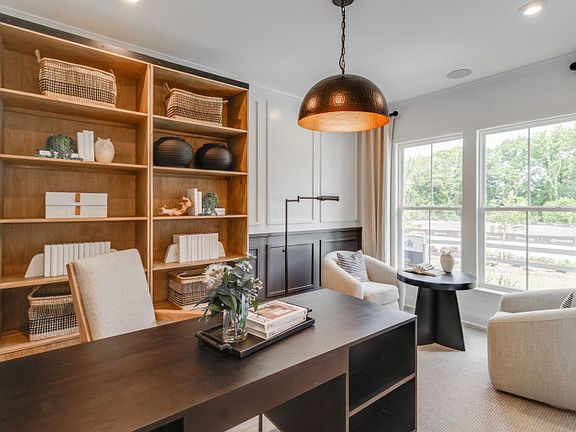 Utilize the versatile flex room, as it serves as a dynamic space easily adaptable to meet changing n