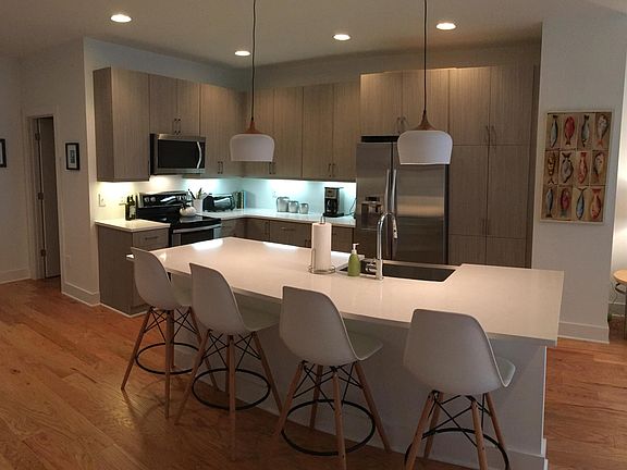 The open kitchen is fully appointed