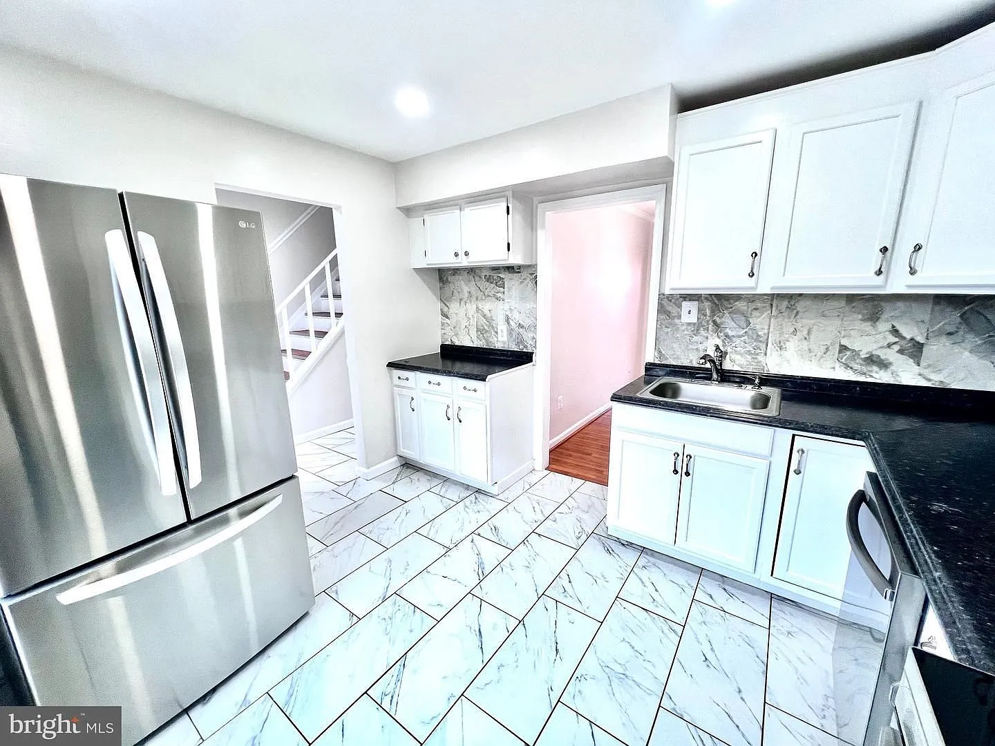 Discover stylish living in this beautifully renovated two level townhome, thoughtfully updated wi... — Photo 3