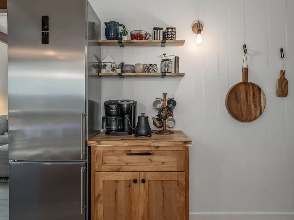 Refrigerator and coffee bar.