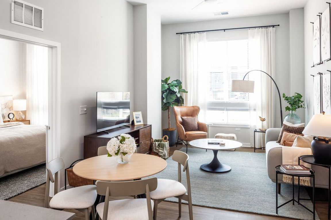 Upgrade Collection living area and dining area with hard surface vinyl plank flooring (Representative photo)
