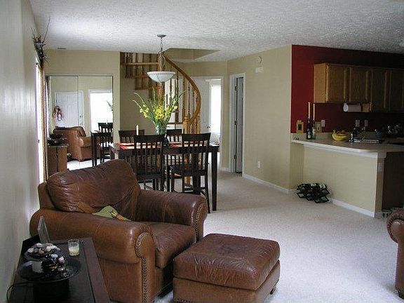 Nice open floor plan. Custom oak spiral staircase