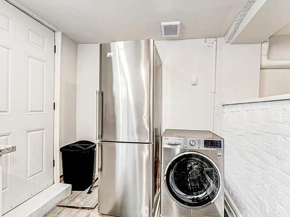 Large refrigerator-freezer and 1 unit washer-dryer!
