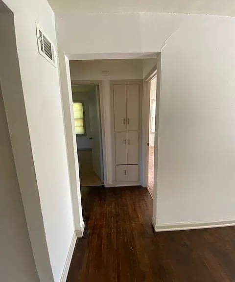 hall to 2 bedrooms and general bath