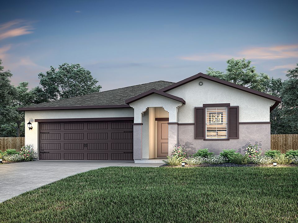 The Carmel is a single-story home with stucco and stone.