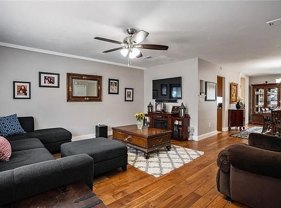 Living room opens to dining room, creating a perfect flow.