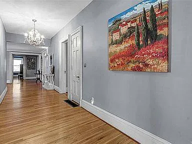 2nd-floor hallway connecting 4 bedrooms, office, and exercise room