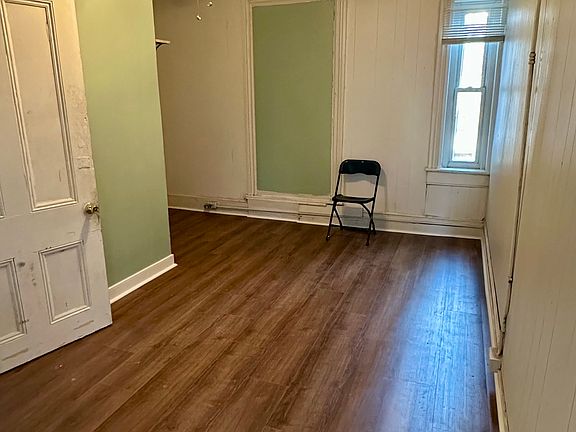 Bedroom with fresh floors and paint