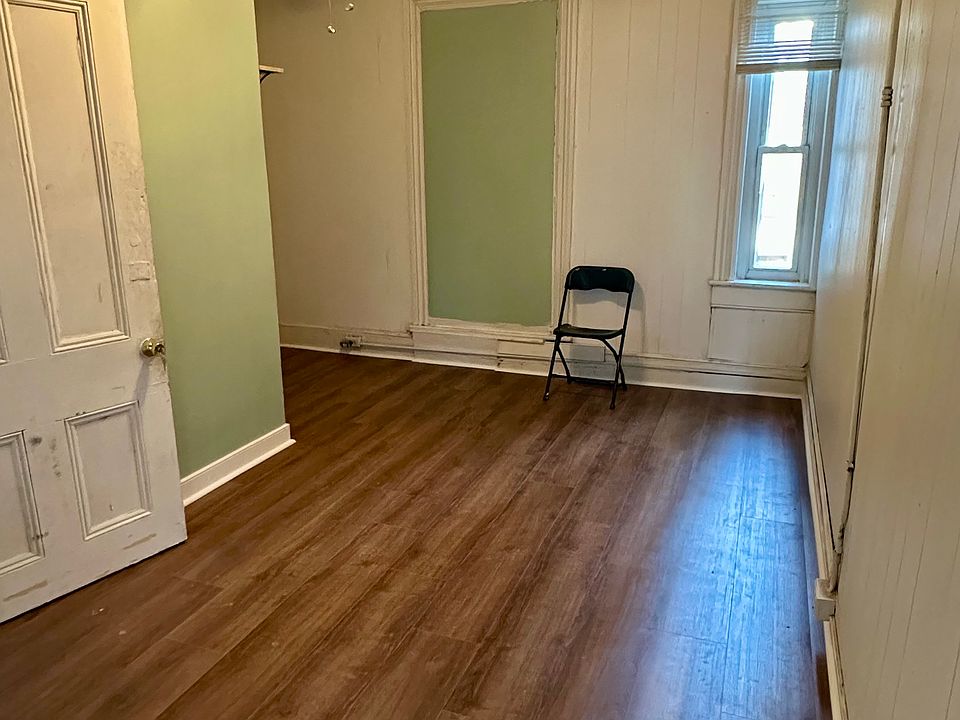 Bedroom with fresh floors and paint