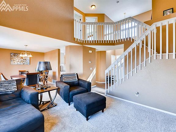 Open Concept with Sweeping Staircase