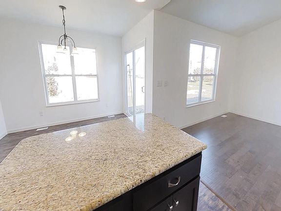 Kitchen Island and Living Room with Patio Door