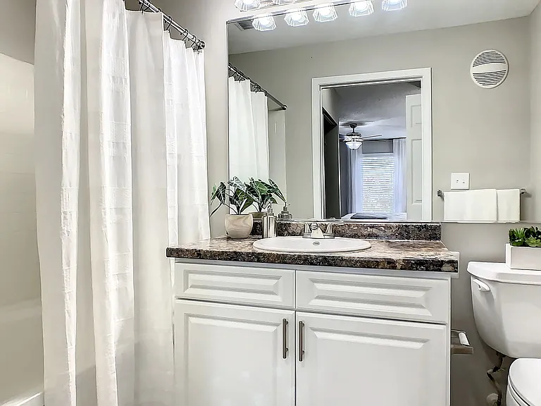 You'll be immersed in our opulent bathroom spaces adorned with exquisite vanities, granite-inspired countertops, and spa-like shower spaces, promising luxurious relaxation.