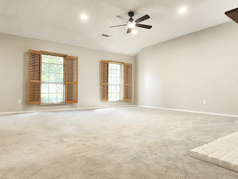 Living room with barn style windows (opened window look)