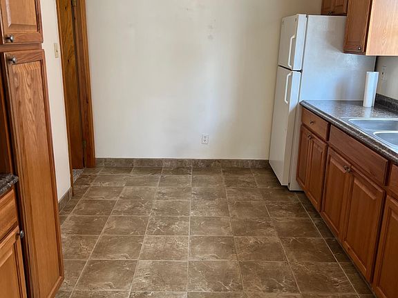 beautifully remodeled kitchen with neutral new tile