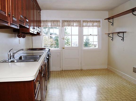 Large kitchen with eat-in area & door to rear yard