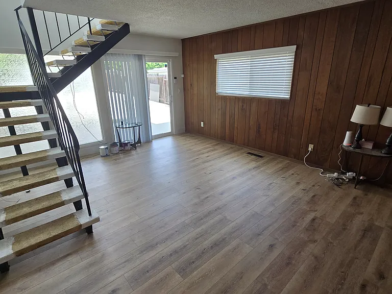 Rear den with sliding door access to patio and back yard