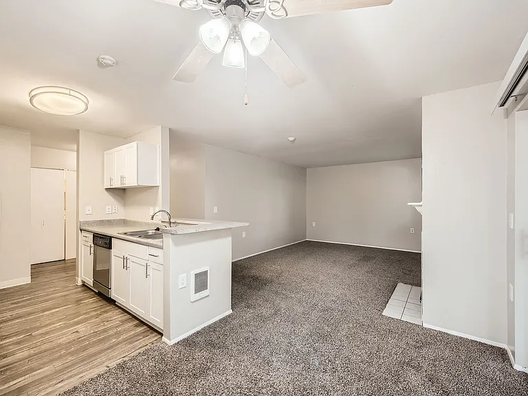 Living Room, Dining and Kitchen in a two-bedroom two-bath at Capitol City in Lacey, WA