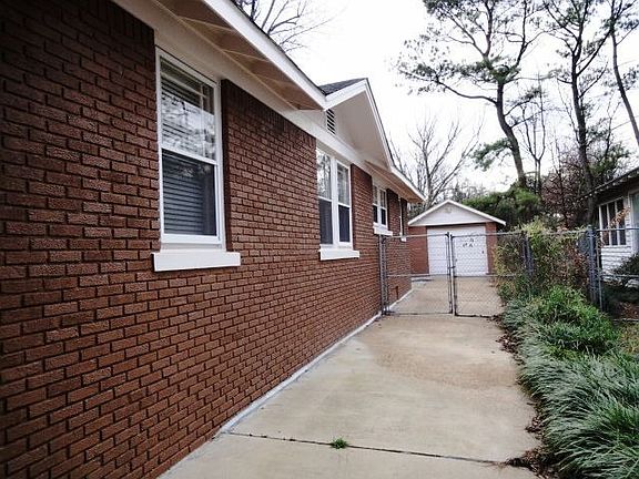 From Under Carport to Backyard