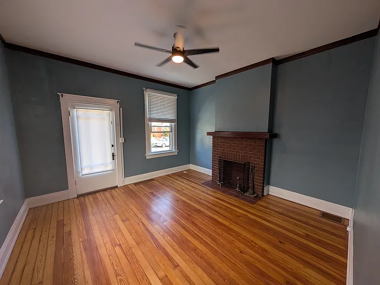 Bedroom. Refinished floors and fresh coat of paint
