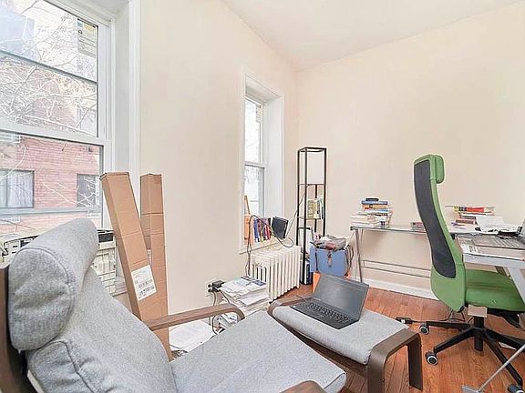 3rd image of 264 E 2nd St APT 23
