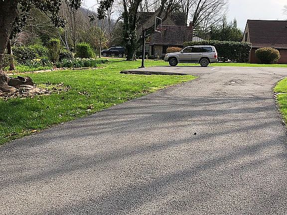 Driveway w/ Basketball Court