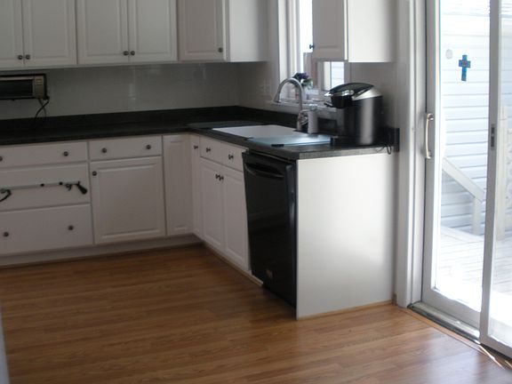 All appliances included- new gas range, dishwasher and fridge!