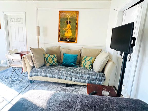 Swivel TV stand with Netflix etc that can be seen from bed or large couch
