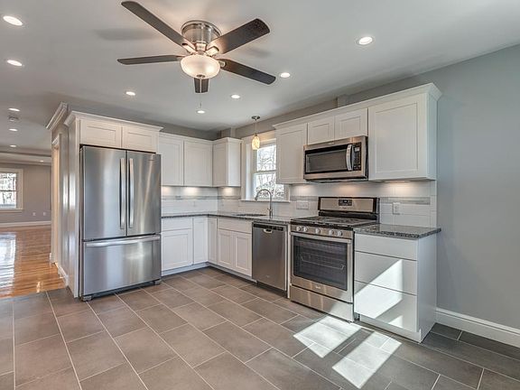 Stainless appliances: refrigerator, gas stove, dishwasher & microwave
Garbage disposal & ceiling fan