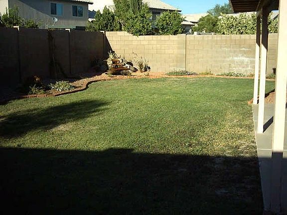 beautiful large yard with exotic waterfall