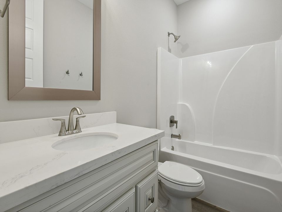 Secondary bathroom in the Sandpiper floorplan at a Meritage Homes community in Gulfport, MS.