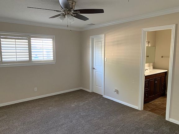 Wood shutters throughout.