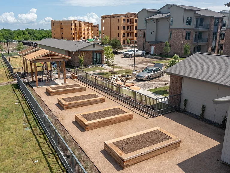 Grow fresh herbs, flowers, and vegetables in our community garden designed for residents to enjoy.