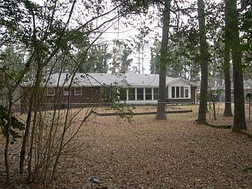 park like backyard, 2 fenced areas, storage building