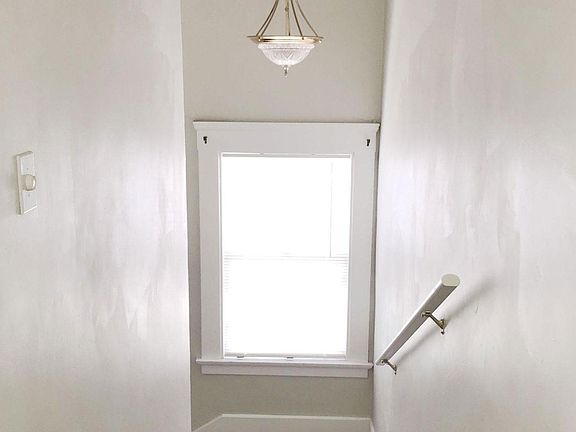 Looking down at front entrance stairs landing