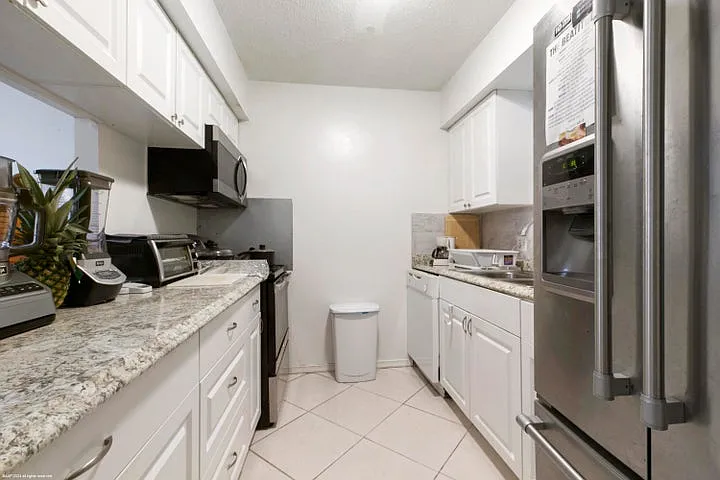 12005 Poinciana Blvd #205 — Photo 8