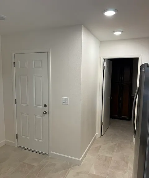 Door coming into kitchen from Garage