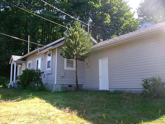 The main house (3 BR., 1 bath, garage, 