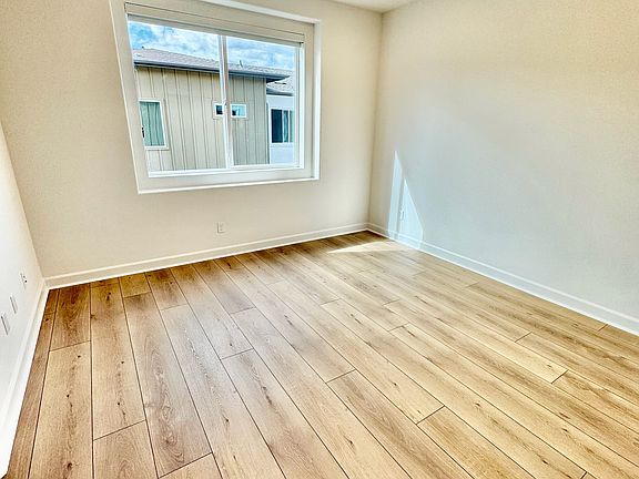 Master bedroom. Size: 12.5'x12'. This is a luxe owner's suite, complete with a private bathroom and walk-in closet.