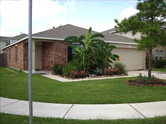 View of 4 bedroom,2 bath, 2 car gar One Story on corner lot.