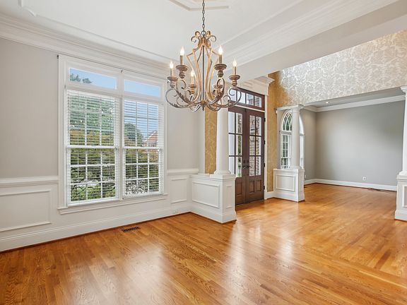 Charming formal dining room off the foyer! This elegant space offers easy access for entertaining, featuring stylish details and a seamless flow, perfect for hosting gatherings and special occasions.