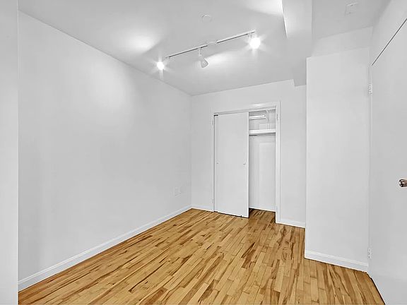 5th image of 319 E 8th St APT 2c