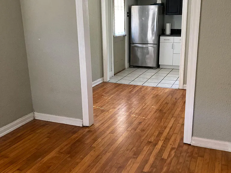 view from living through dining to open kitchen